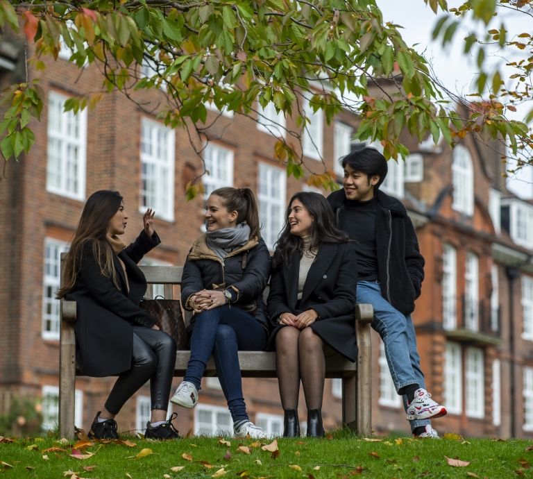 Students Students sitting outside Tuke Lawns